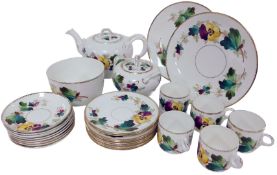 A mid 19thC Staffordshire porcelain part tea service, painted with pansies, comprising a teapot,