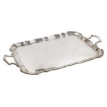 A George V silver twin handle tray, with a pie crust border, maker's name worn, Sheffield 1932,