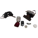 A pair of Carl Zeiss Deltrintem 8x30 binoculars, in a brown leather case initialled THM, and a