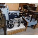 An Able World folding wheelchair, ottoman, nest of tables, retro kitchen table, red leather finish