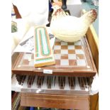 A boxed games compendium, with glass boards for backgammon, chess, together with a lidded egg