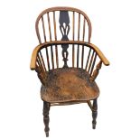 A 19thC low back ash and elm Windsor chair, with Retford style splat and ring turned front legs
