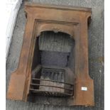 A Victorian cast iron fireplace, with front raised arched moulding and fixed grate, 86cm high,