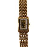 A Brooks and Bentley ingot style wristwatch, in plated and stainless steel mount, boxed.