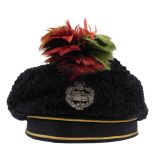 An elaborate British Royal Tank Regiment (RTR) officer's Astrakhan beret, in black textured lamb's
