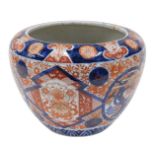 A 19thC Japanese Meiji period Imari pattern jardiniere, of tapering circular form, decorated with