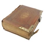 A Victorian brown leather and brass-bound Holy Bible. (AF)