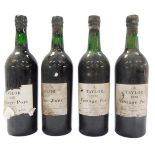 Four bottles of Taylor 1970 vintage port, 75cl, each with a wax seal and partial paper label.