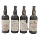 Four bottles of Royal Oporto 1985 vintage port, 75cl, each with a seal and bearing partial label.