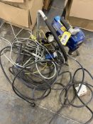 Graco 390 airless paint sprayer with hoses