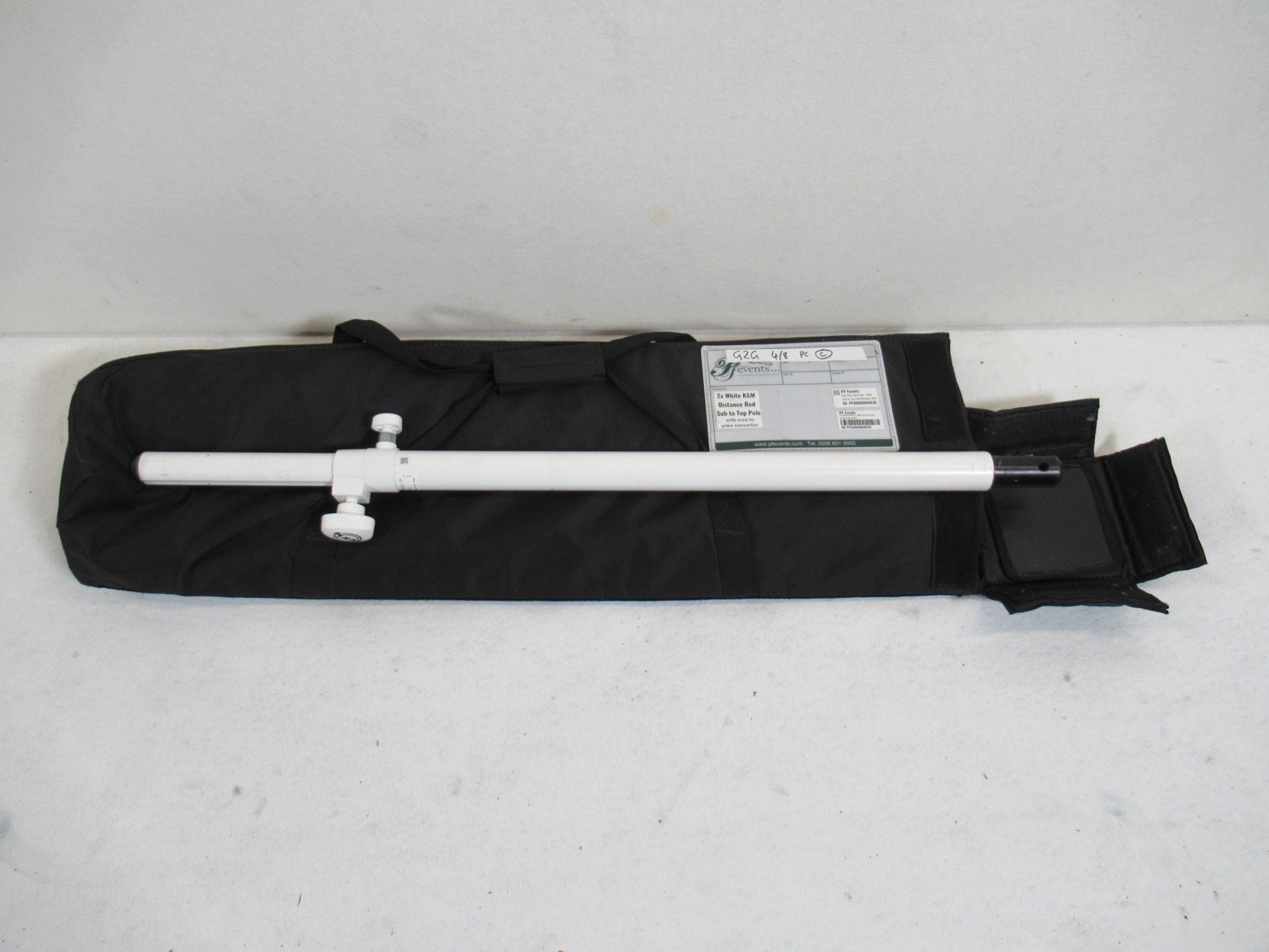 (2) K&M white distance rods in soft bags