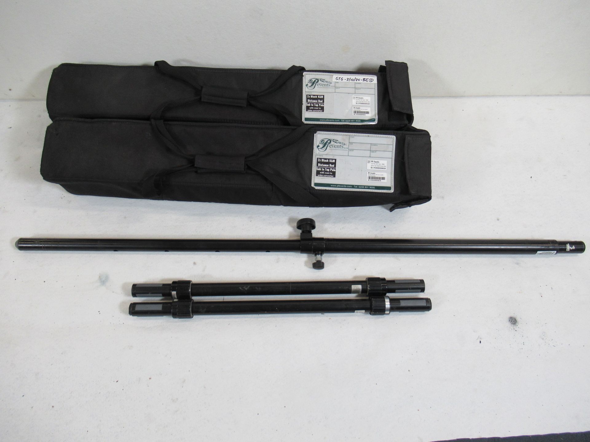 (4) K&M black distance rods in soft bags