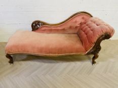 A 19th century carved walnut chaise longue