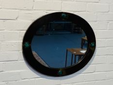 A good Arts & Crafts hand beaten copper/brass oval wall mirror