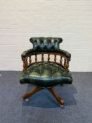 A reproduction revolving captains chair