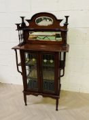 An Art Nouveau mahogany side cabinet