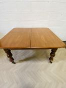 A good mid 19th century mahogany extending dining room table