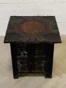 A small late 19th century Indian fold away square top table
