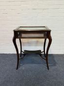 A 1920's mahogany bijouterie table