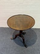 An 18th century mahogany tilt top occasional table