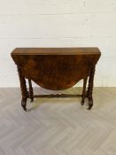 A 19th century burr walnut sutherland table