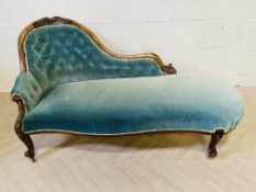 A 19th century carved walnut chaise longue