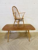 An Ercol dining room table and chair