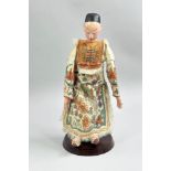 Chinese Doll of a man dressed in traditional costume, signed, early C20th.