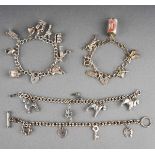 Four white metal/ silver ( marked silver) charm bracelets, one with heart shaped locket and one t-