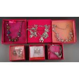 A collection of boxed and loose Butler & Wilson teddy bear themed costume jewellery, comprising a