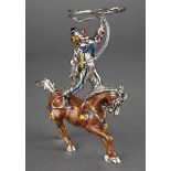 A late 20th century Italian silver and enamel clown figure of a rodeo rider on horseback swinging
