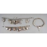 Collection of 3 white metal/ silver ( marked sterling and silver ) charm bracelets, one with heart