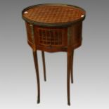 A French Louise XV style marquetry oval side table, gallery above three central drawers on
