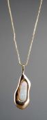 An opal pendant with 18ct gold chain. The abstract design pendant set with an opal, suspended from