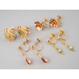 A collection of four earrings. To include a pair of turquoise earrings (stamped 18), a pair of red