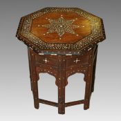 A late 19th century / early 20th century Anglo-Indian bone marquetry and ebony strung hardwood low
