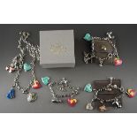 Four pieces of Vivienne Westwood costume jewellery, comprising three charm bracelets and matching