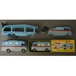 A bag of Dinky vehicles to include a Dinky Delivery Service Transporter no. 982, Dinky spare body