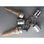 Four silver and one EPNS mounts for hunting trophies, presumed for fox paws or similar, two with