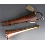 A Georgen Parker & sons of London brass and copper hunting horn with leather sheath, small split