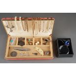 A box of late 19th and 20th costume jewellery, gold plated guard chain, silver brooch, worn