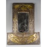 An arts and crafts Mirror decorated with swallows, measuring approx. 58 cm tall ans 45.5 cm wide