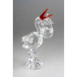 Swarovski stork with detachable basket, marked on the base, orange accent to bill, approx 11.5cm