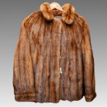 A vintage Mink swing jacket designed by Louis Fine Furs of Hove, label to silk lining, with three