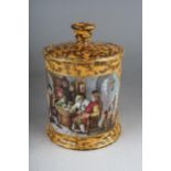A Prattware The Smokers (405) tobacco jar and cover with mottled background retailed by Thomas