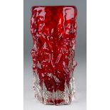 GEOFFREY BAXTER for Whitefriars, a Ruby red glass cylindrical bark vase, height 15 cm. Very good