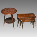An Arts & Crafts carved mahogany tripod table, the two tier table incised with floral decoration