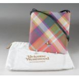 A Vivienne Westwood Harlequin leather cross over body bag, with bas-relief orb plaque to front and