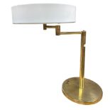 Walter Von Nessen for Nessen Studios. Lamp with articulating arm. Rare design. Bronzed brass base
