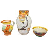 Clarice Cliff 'Bizarre' range - A Rhodanthe pattern ribbed vase, H 29cm; Nasturtium pattern jug, H